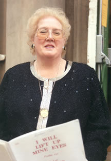 Barbara Gale posing with song sheet